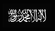 Ein Banner der Kern-al-Qaida mit arabischen Schriftzeichen.